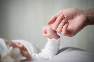 Як отримати грошову допомогу при народженні дитини?